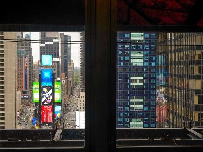 Looking outside at the bustling streets of Times Square now from the windows of this quiet, almost-empty building made me feel like, inside, time had stopped.