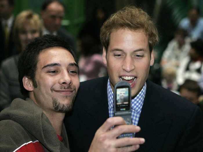 Prince William was pictured using a flip phone during a visit to Auckland