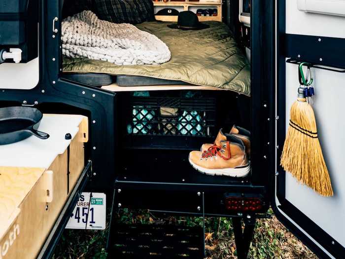 For meals on the road, the TigerMoth has a pull-out 5.5-square foot kitchen with storage and a two-burner stovetop. And when it