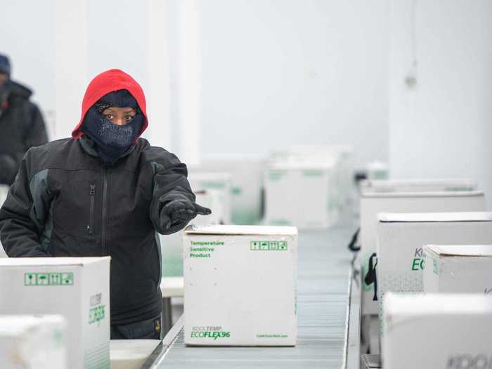 Workers at a distribution center in Olive Branch, Mississippi, prepared the shipment of the Moderna vaccine supply Sunday.