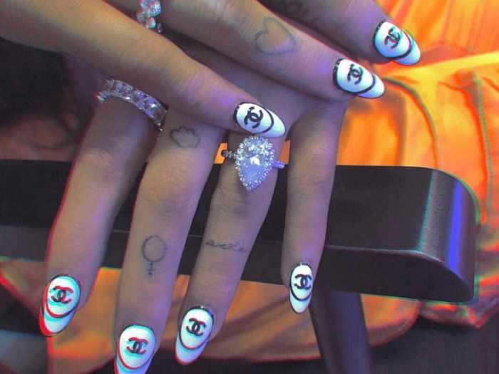 July 11: Grande debuted a new finger tattoo that appears to say "pete."