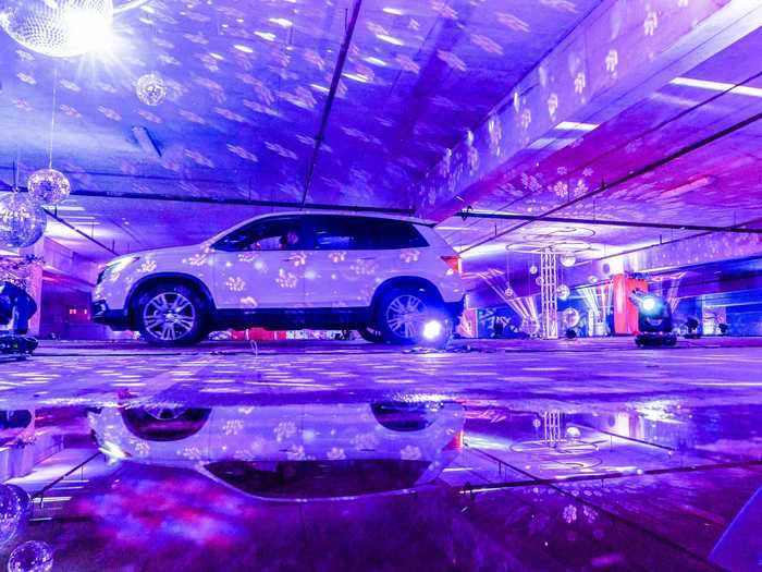 Starlight Lane, a drive-thru Christmas show in Seattle, took place in a parking garage where patrons tune into a radio station for synchronized music.