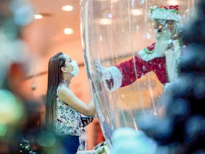 Even adults took the opportunity to press their hands against Santas