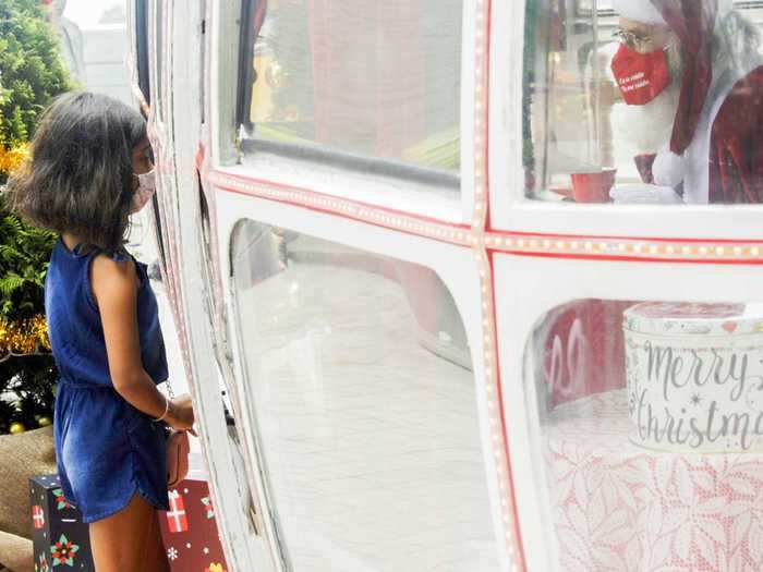 In Rio de Janeiro, a Christmas event creatively reused a retired cable car to keep Santa and children safely apart.