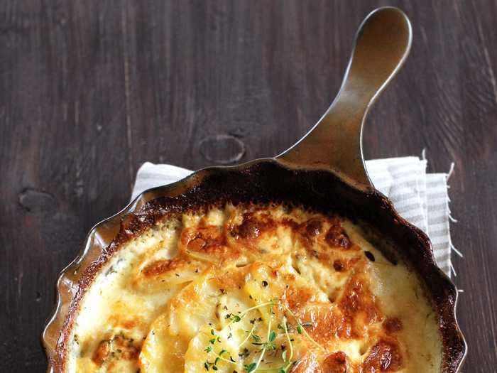 Give your classic potato gratin an extra special twist by throwing some black truffles into the mix.