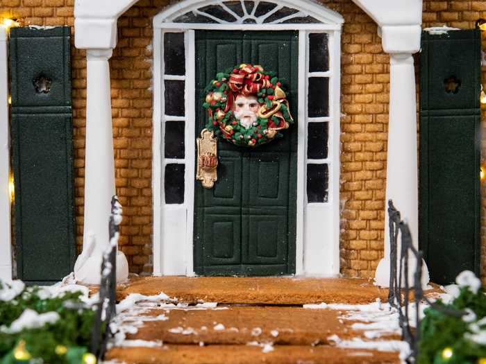 The amazing replica includes an array of Christmas decorations like lights, bows, and the elaborate wreath shown in the film.