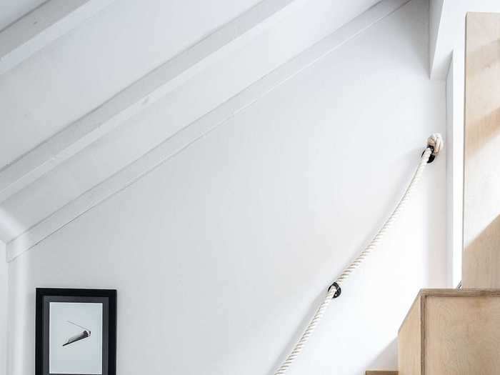 There is also a secondary set of stairs that lead to a sleeping platform in the home