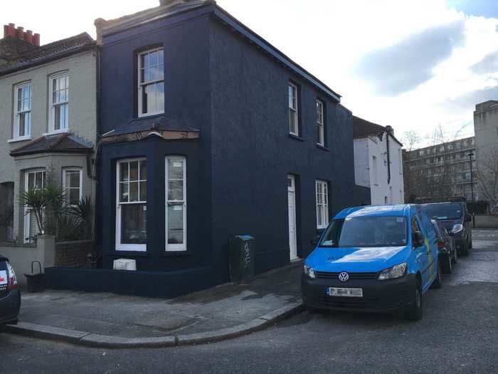 This is what the house now looks like on the outside, painted a deep shade of blue that