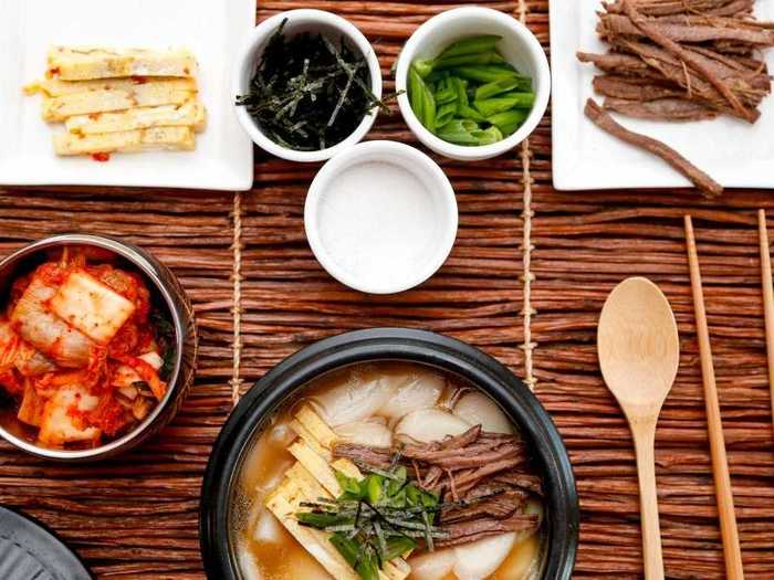 Koreans tend to celebrate the Korean Lunar New Year with Tteokguk - rice cake soup.