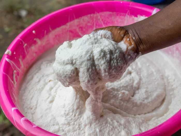 Fufu is a popular mash made from a dough of starchy flour - like cassava, yam, or plantain - and hot water picured below. It