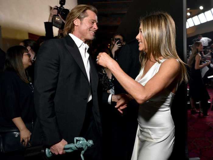 Photos of exes Brad Pitt and Jennifer Aniston reuniting backstage at the SAG Awards went viral.