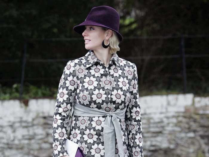 Zara Phillips wore a statement coat with purple accessories to Christmas Day services in 2006.