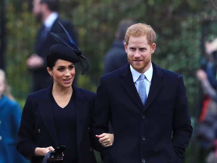 For her second Christmas service appearance, Markle opted for a more toned-down, all-black outfit alongside a similarly smart Prince Harry.