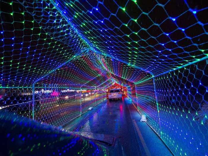 People across the globe observed festive holiday lights in the form of car-friendly tunnels.