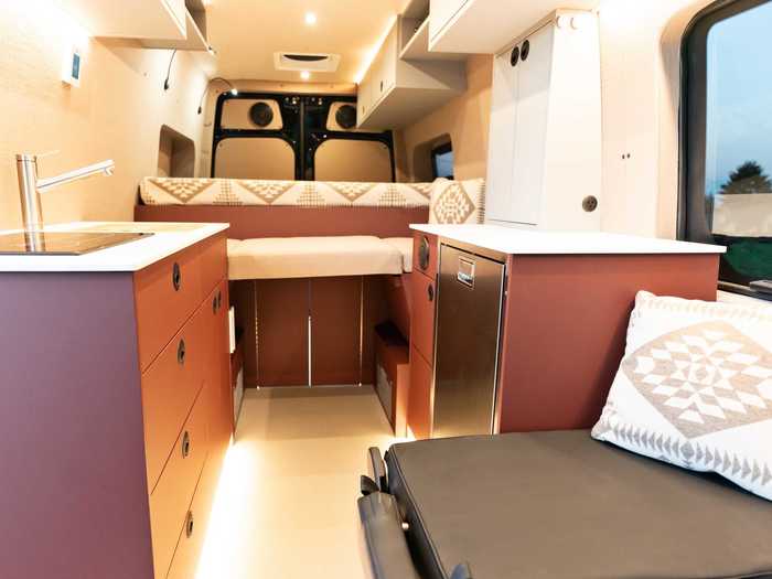 Storage throughout the camper van includes the aforementioned under-bed garage and cabinets, several of which can be found in the kitchen.