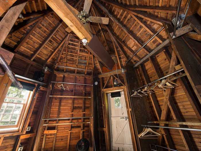 The third floor of the home still has the original mechanics of the windmill, the listing states. It now serves as a cedar closet.