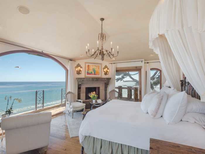 The master bedroom features a fireplace and a private wraparound terrace.