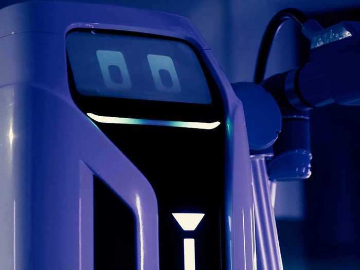 Like any human, the robot can operate an EV