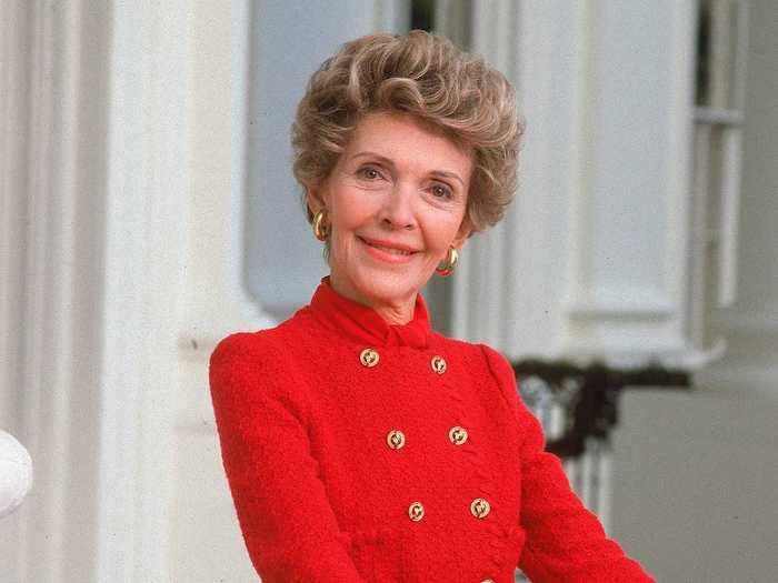 This the real Nancy Reagan wearing her signature red suit.