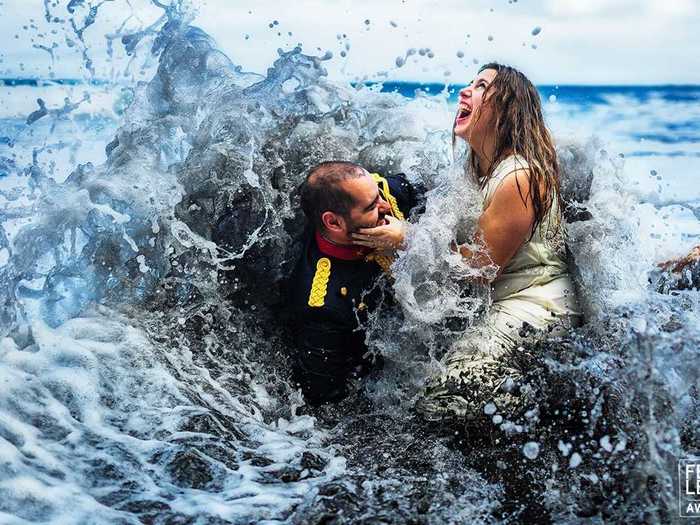 Photographers followed brides and grooms wherever they went, even into the ocean.