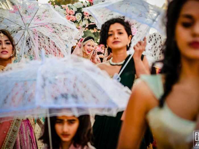 Even when standing in the background, brides remained the center of attention.