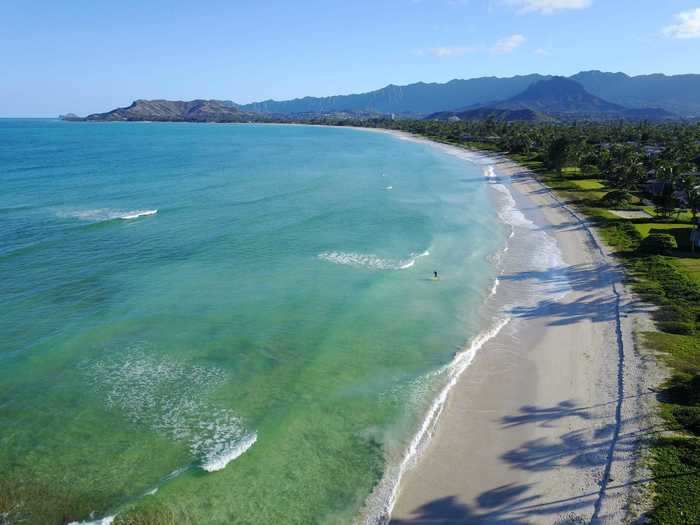 The vacation rental is steps from Kailua Beach, a 2.5-mile stretch of pristine sand that