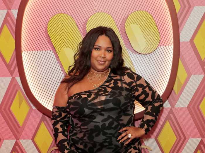 Lizzo changed into a short black see-through dress for the BRIT Awards after-party hosted by Warner Music and CIROC.