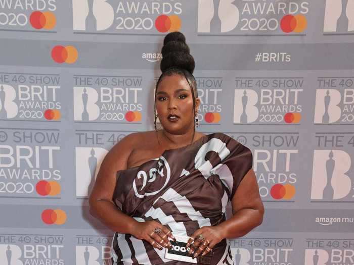 On the red carpet for the BRIT Awards in February 2020, Lizzo dressed up in a brown dress modeled after a Hershey