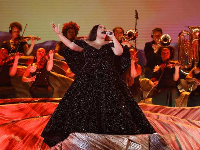 Later in the night, Lizzo had an outfit change. She donned a billowy, off-shoulder black gown with sequins for her performance.