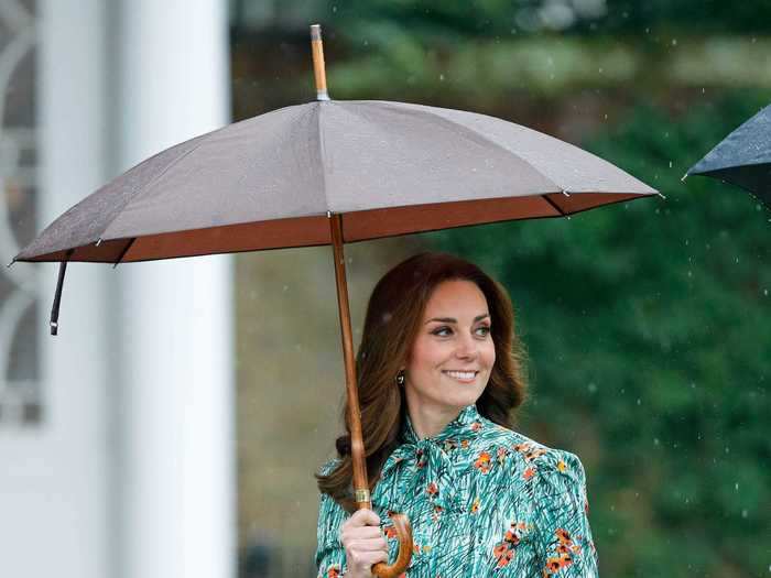 The Duchess of Cambridge visited the Sunken Garden on the grounds of Kensington Palace in a floral dress.