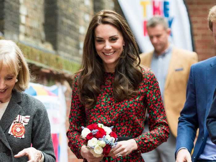 Middleton wore a festive printed dress to attend a Christmas party for volunteers at the nonprofit youth group The Mix.