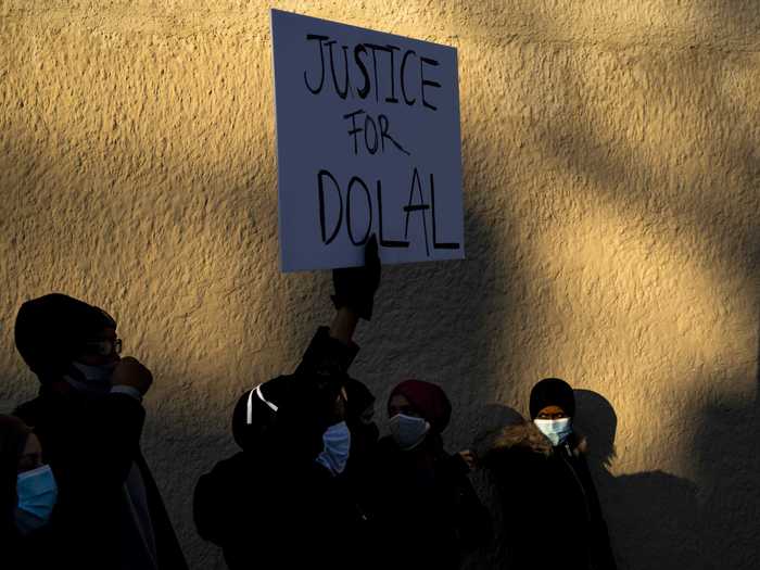 Supporters gathered at the gas station where Idd was fatally shot and where members of his family addressed the crowd.