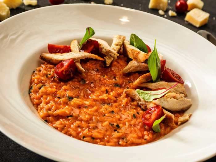 The sweetness of Champagne and the tart flavor of tomatoes would be perfect for a warm tomato risotto dish.