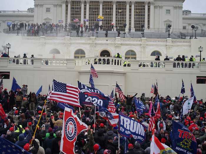 Capitol with sea of people, flags AC.JPG