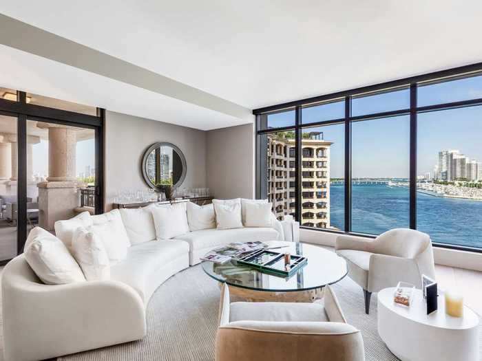 The condo features 10-foot floor-to-ceiling windows.