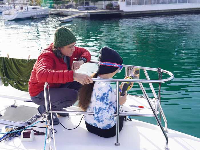 On Wednesday, the family started their day with some boat repairs.