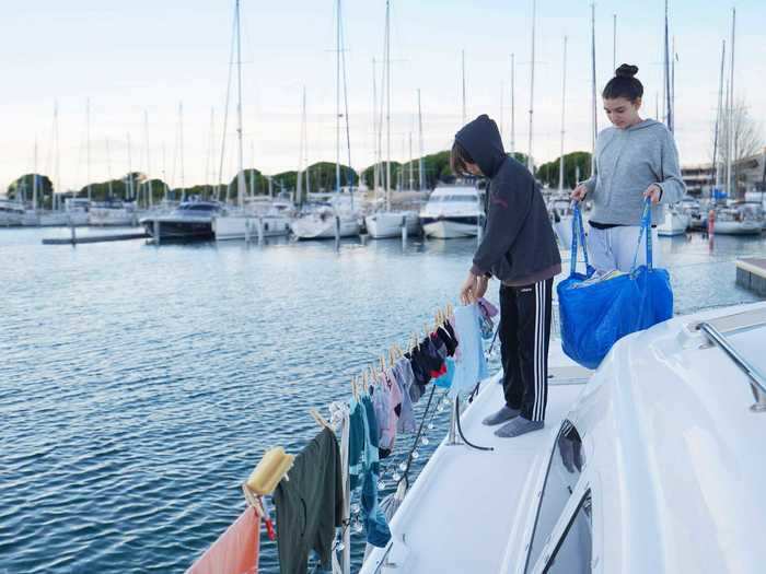 The next morning, the family endured a complicated laundry process, which ends with the children hanging the clothes out to dry.