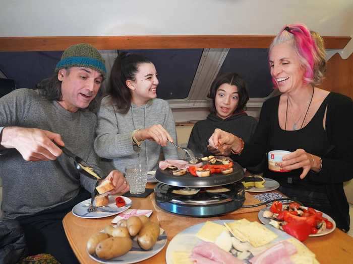 Later that day, the family sat down to eat raclette for dinner - a family holiday tradition.