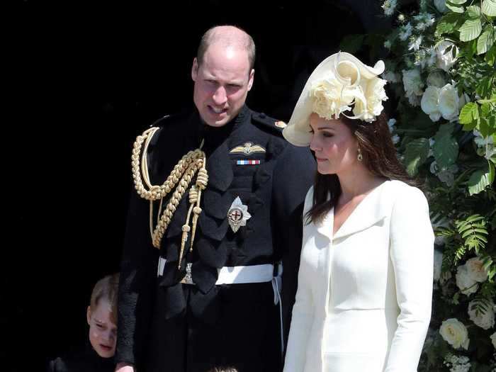 2018: The Duchess of Cambridge appeared alongside the duke and their children, Prince George and Princess Charlotte, to watch Meghan Markle and Prince Harry