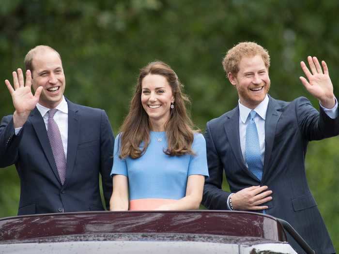 2016: The Duke and Duchess of Cambridge and Prince Harry were greeted by royal fans outside The Mall at Buckingham Palace as they attended the Queen