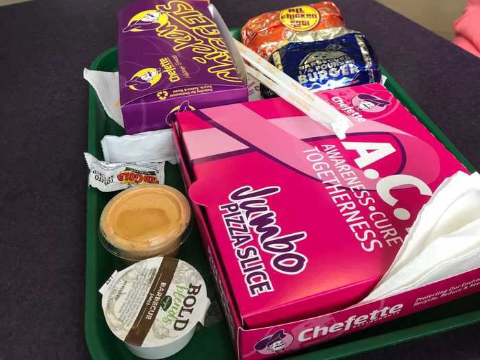 The packaging was a mix of cardboard and foil, and continued the bright, colorful theme - including a Breast Cancer Awareness pink box for the pizza.