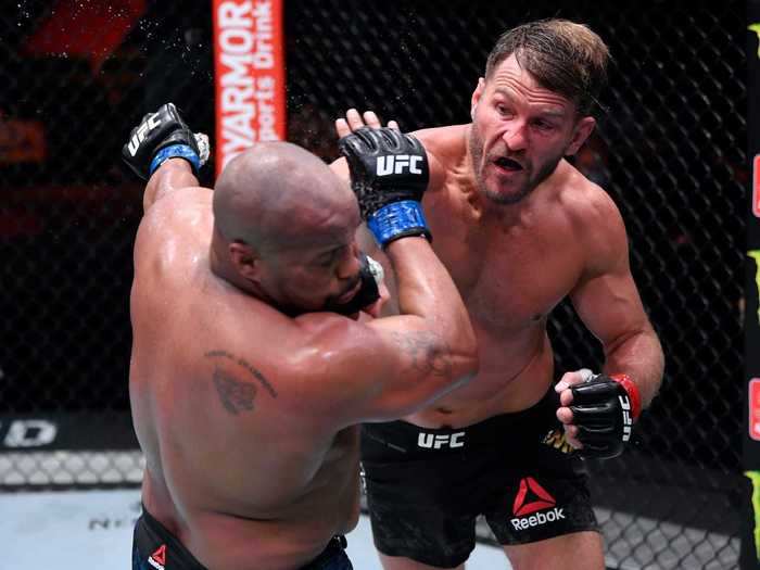 5: Stipe Miocic - 20 wins (15 KOs and 5 decisions) against 3 losses (2 KOs and 1 decision).