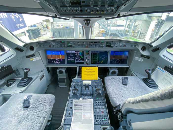 It largely resembles the cockpit of a private jet, which is par for the course considering the aircraft originated as a Bombardier plane.