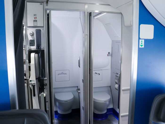 The plane has three lavatories including two in the back and one in the front. The rear lavatories are angled to provide more space.