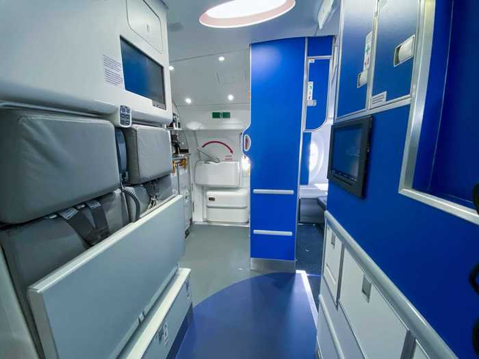 But the seats are only one portion of the aircraft with countless smaller touches incorporated into the design. In the galley, the different colors on the floor indicate the passenger area from the flight attendant workspace.