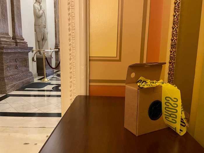 A roll of police tape sat on a table just outside the door that leads to the House chamber.