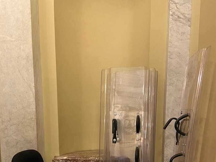 Capitol police riot shields rested in a corner at a security checkpoint just outside the House chamber.