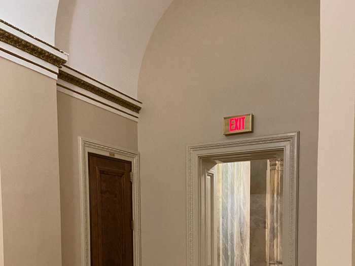 Just down the stairs, the Senate doorway where Capitol police officer Eugene Goodman single-handedly faced down a mob stood empty.