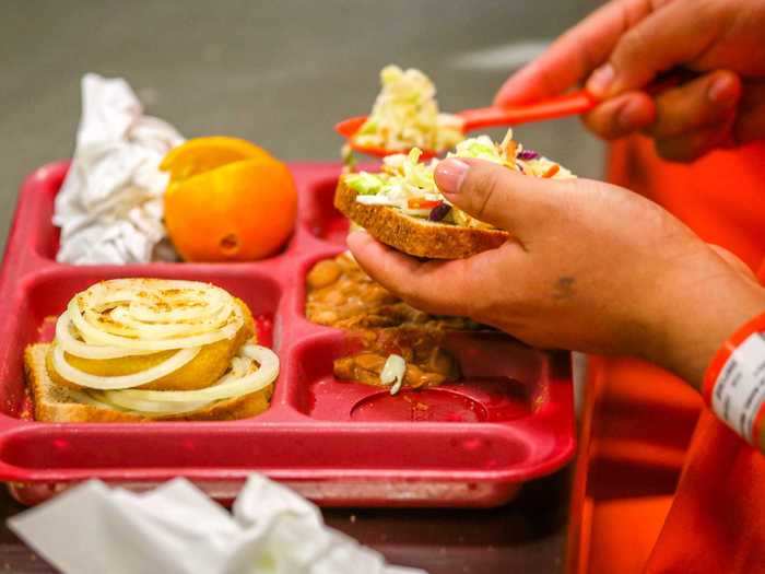 For lunch in US prisons, bread, a fruit, a vegetable, and some kind of protein, like beans, are standard.