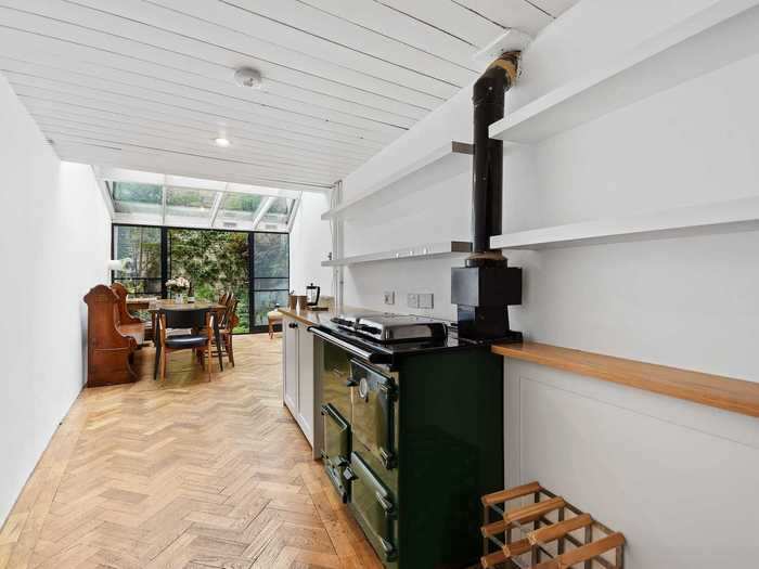 The kitchen is also equipped with an AGA cast iron cooker.